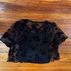 Gently used like new black see threw crop top with black tank top under